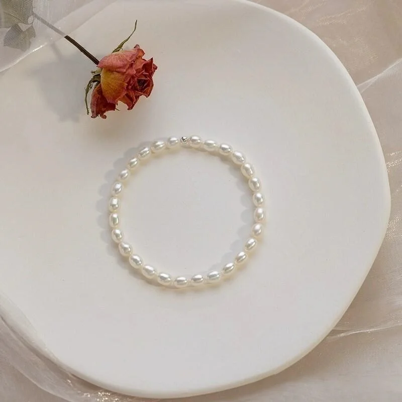 

Real Natural Freshwater Rice Pearl Bracelet 925 Silver Bead Elastic Rope Pearls Jewelry for Women Gifts