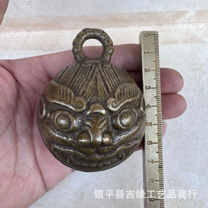 Antique bronze bell, retro-style, with a tiger head or bull head design, a vintage home decor hanging ornament, and a bell with