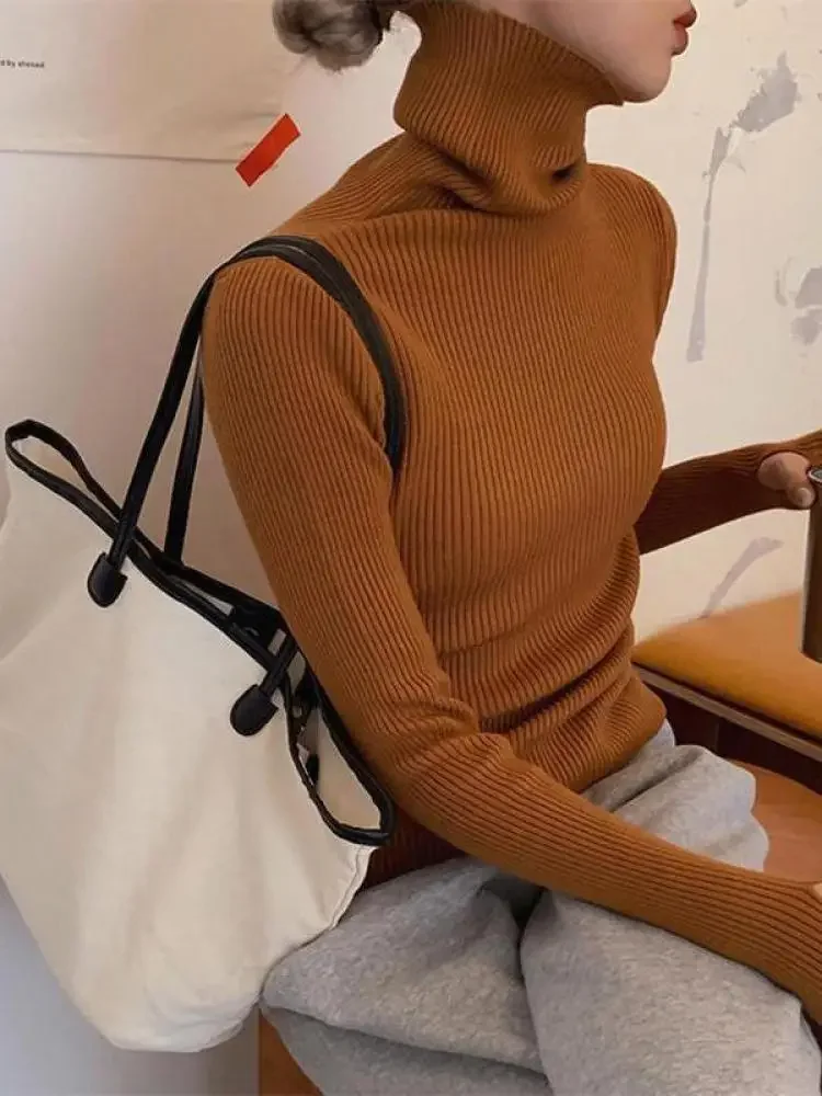 เสื้อสเวตเตอร์คอเต่าผู้หญิง ดีไซน์เรียบหรู สไตล์เกาหลี ผ้าถักแบบพื้นฐาน สวมใส่สบาย มีช่องสำหรับนิ้วโป้ง แฟชั่นทันสมัย
