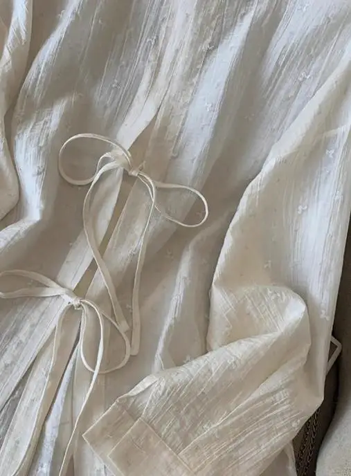 Blusa de mujer 2026 nueva primavera otoño Color sólido temperamento cuello vuelto manga larga suelta ajuste Casual diario camisa con cordones