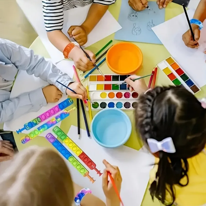 10 Uds. De juguetes coloridos de silicona con burbujas, pulseras ajustables para aliviar el estrés y la relajación, regalos para niños y recuerdos de fiesta