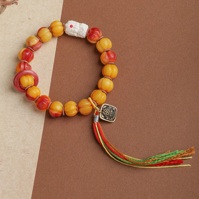 Tibetan-style bone bracelet pumpkin accents, paired with imitation Kintsuke beads and Zaki Ram jewelry