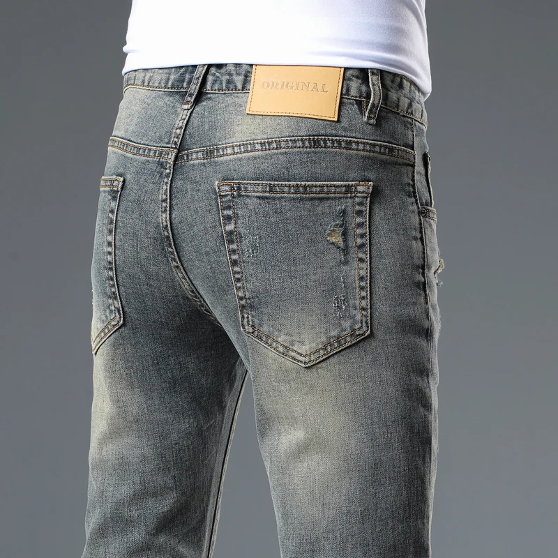 2025 ヴィンテージジーンズスキニー男性ユーズド加工デニムパンツパッチワークヒップホップリッピングジーンズ男性バイク全身ズボン