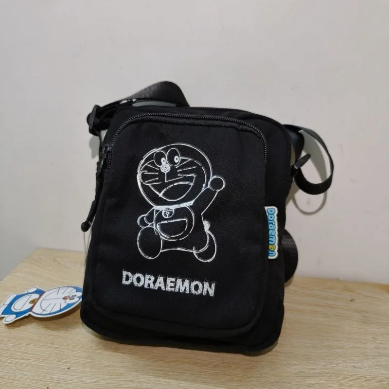 Anime Doraemon merchandise borsa di tela da donna di marca co, tracolla per studenti, borsa a tracolla di nicchia, borsa casual per cellulare, regalo