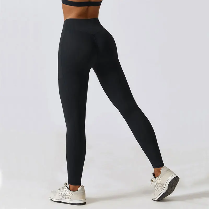 Jednolite legginsy damskie miękkie spodnie treningowe stroje Fitness spodnie do jogi z wysokim stanem stroje gimnastyczne Spandex legginsy Push Up