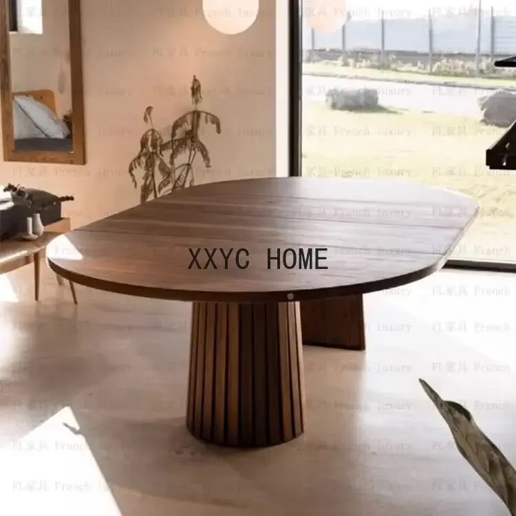 

Italian minimalist dining table North American black walnut solid wood oval dining table designer wabi sabi wind