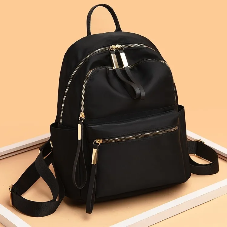 

Женский рюкзак из оксфордской ткани, легкий, для путешествий, повседневный, холщовый, на два плеча, новинка 2026 года, трендовый, корейский, универсальный.