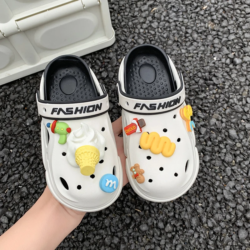 A pair of children's summer slip-on sandals with soft and comfortable soles, featuring a hole design. Model number: YJ-61302