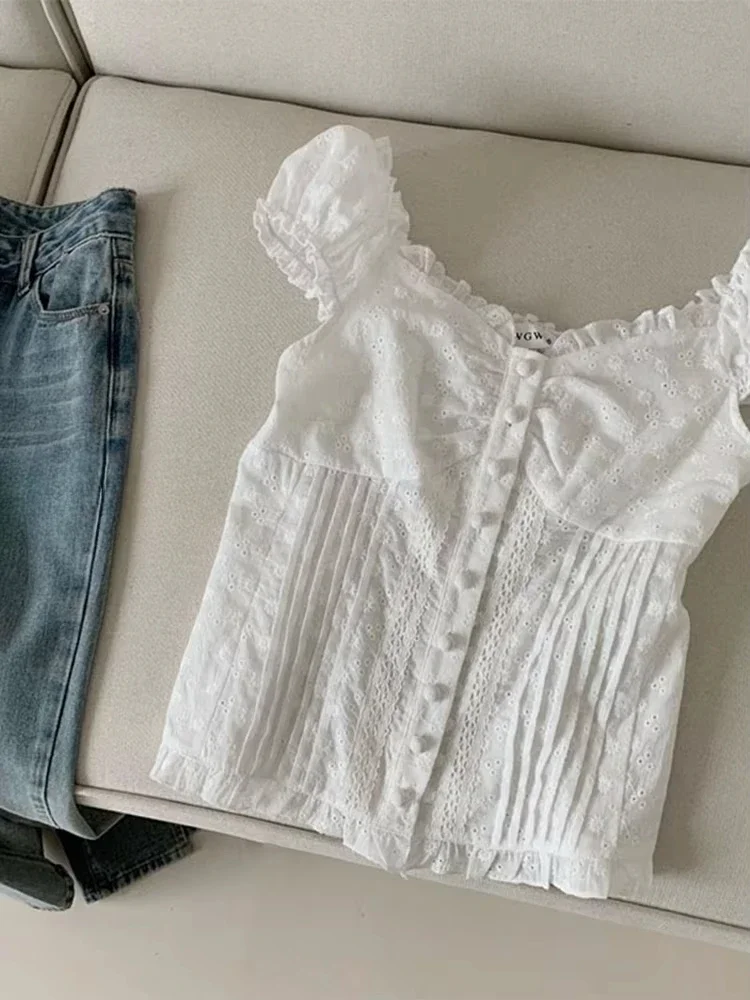 

2025 New Women White Hollow Out Design Shirt Pleated Slash Neck Puff Sleeve Blouses Female Slim Ruffle Single Breasted Clothes