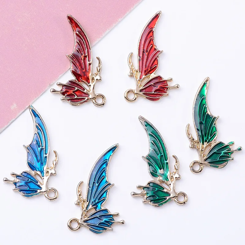 

100Pcs sets DIY handmade hair hairpin left right symmetrical butterfly pendant three-color transparent oil dripping wholesale