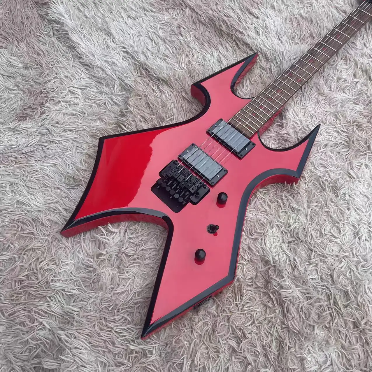 

B. C-style 6-string electric guitar with integrated electric guitar, red body and black rim, high gloss, rose wood fingerboard,