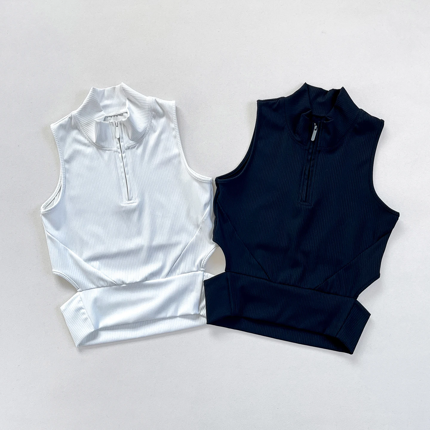 

2025 New Arrival Slim Fit Ribbed Sleeveless Mock Neck Zip - Up Crop Tank Tops for Women