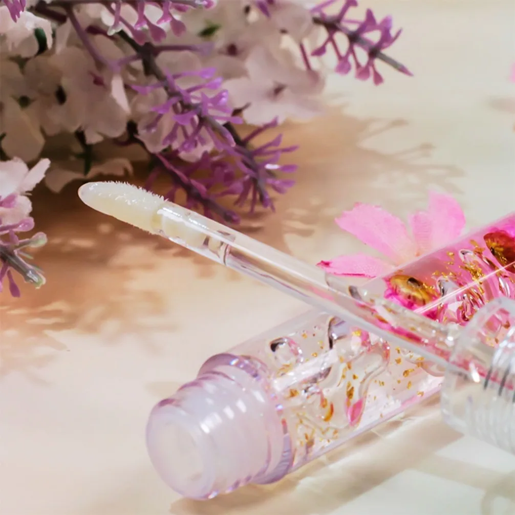 Huile à lèvres vegan à la fleur de marguerite, brillant transparent hydratant pour les lèvres sèches, marque privée, logo personnalisé, maquillage en gros, nourrit les lèvres, cosmétiques