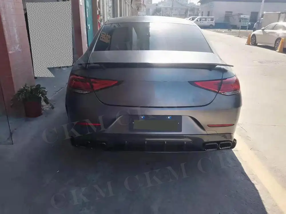 

Carbon Fiber for Mercedes Benz CLS W257 CLS300 350 450 CLS53 63 AMG 2018-2021 Rear Bumper Diffuser with Silver Exhaust Tips