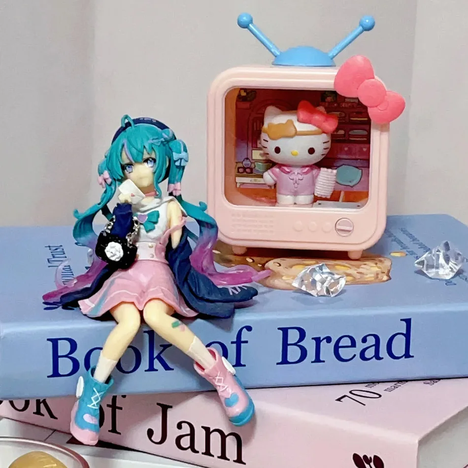 

14CM Hatsune Miku Anime figure sailor suit Pink sakura sitting position PVC Action figure model toy decoration collect gifts