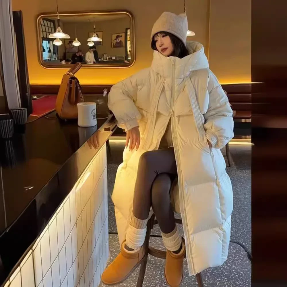 Nueva versión coreana de invierno, edredones gruesos de plumón de pato blanco para mujer, abrigo holgado largo por encima de la rodilla, tendencia