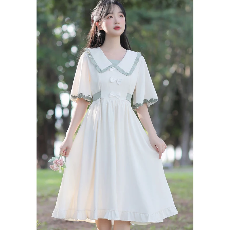 

Sweet Peter Pan Collar Bandage Folds Bow Princess Dress Female Clothing 2024 Summer New Loose All-match Flare Sleeve Midi Dress