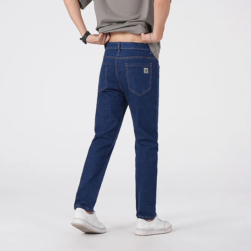 جينز رجالي لخريف وشتاء 2025 نمط عمل خفيف غير رسمي بقصة ضيقة سروال طويل عصري متعدد الاستخدامات مقاس كبير 38