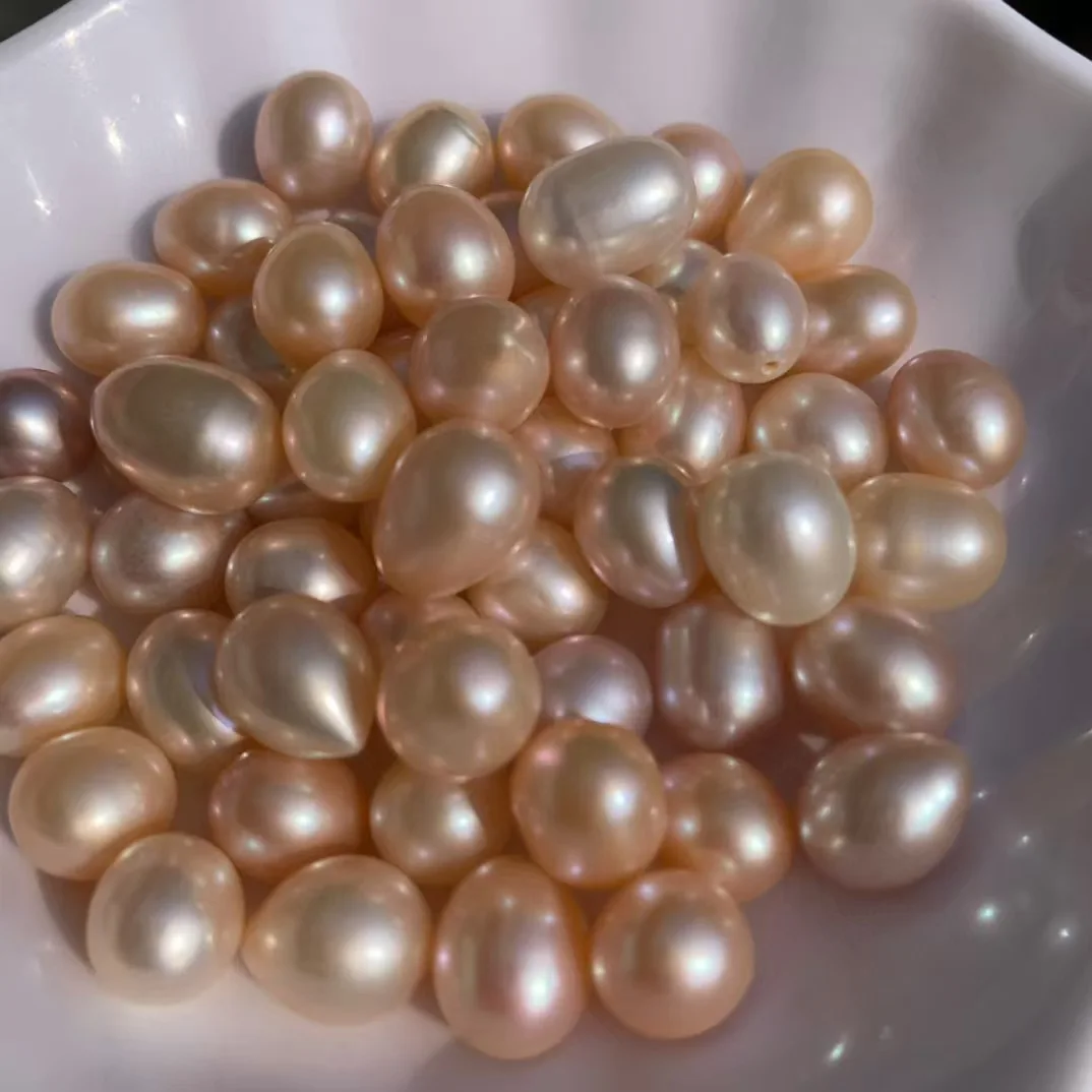 AA غرامة 100% الطبيعية البيضاوي لؤلؤ المياه العذبة فضفاض الأرز شكل خزر عازل لصنع المجوهرات سوار ذاتي الصنع أقراط اكسسوارات