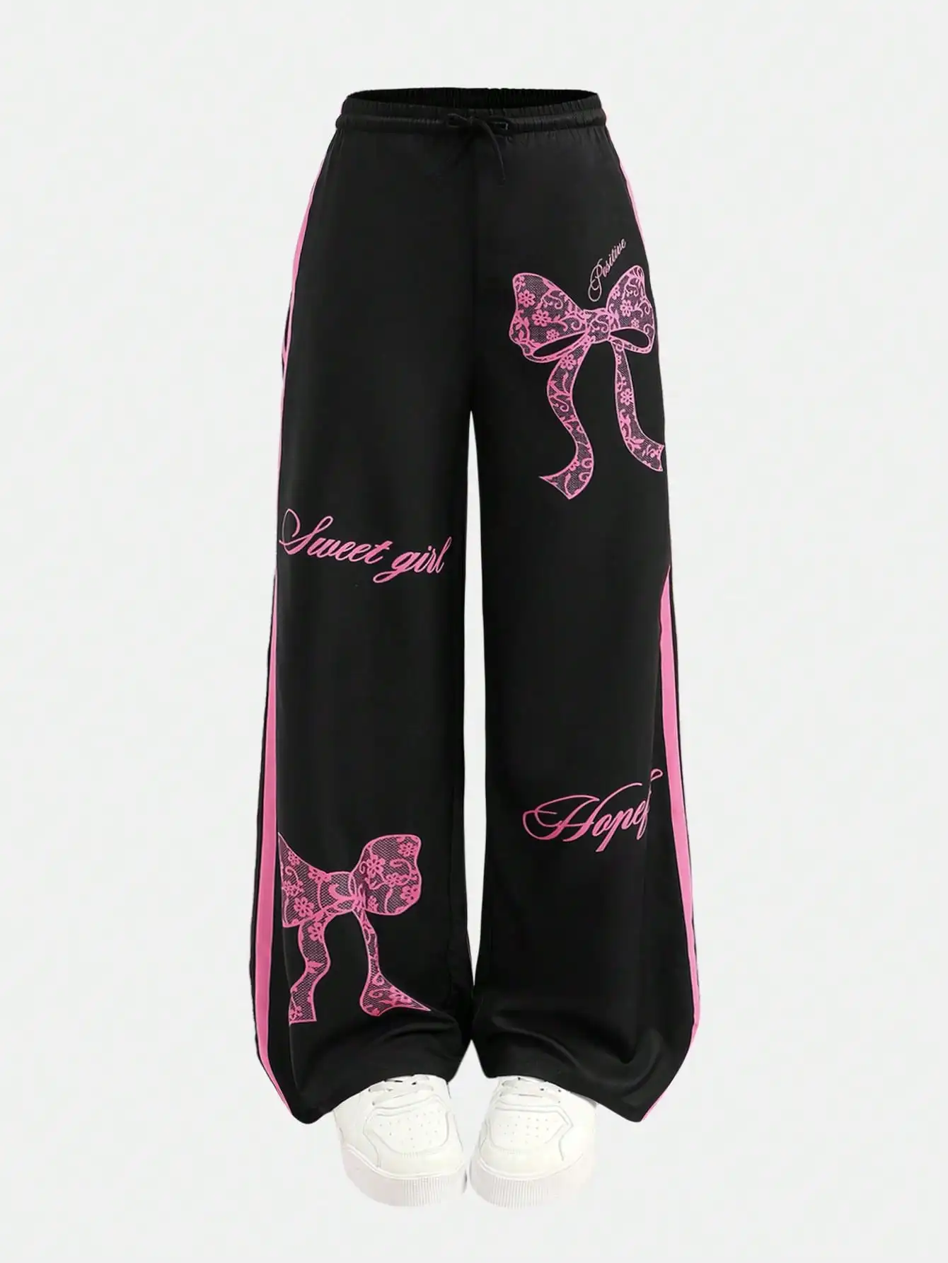 

Черные широкие тканые брюки с розовым бантом и надписью для подростков