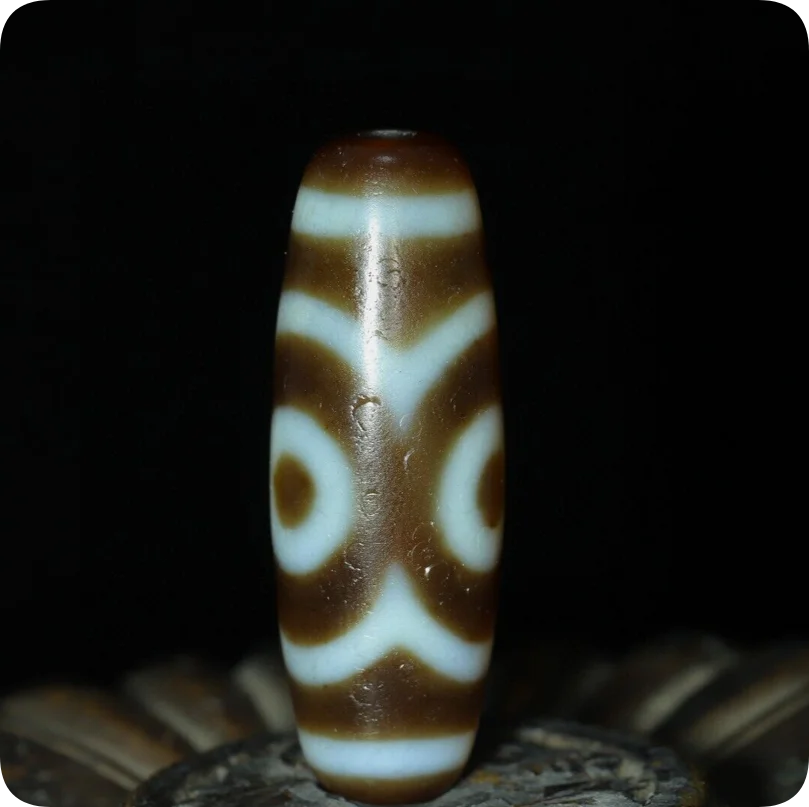 Tibetan black and white lotus three eyed Dzi bead agate 12 * 36mm