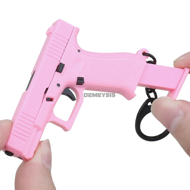 Brelok do kluczy G45 1:4 Mini brelok do kluczy w kształcie pistoletu Przenośny model Glock 45 Plastikowy brelok do kluczy Odłączane dekoracje broni