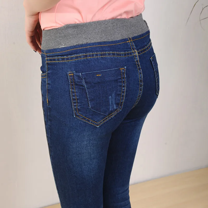 กางเกงยีนส์ผ้าฟลีซหนาสำหรับฤดูหนาวของผู้หญิง กางเกงยีนส์ยืดเอวยางยืดสีดำ