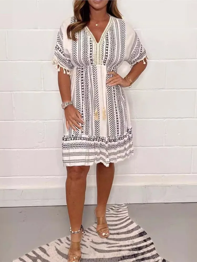 新しい夏のスタイル女性のためのルーズプリントレース V ネックワンピーススカートファッションフリンジ半袖カジュアル休暇ドレス