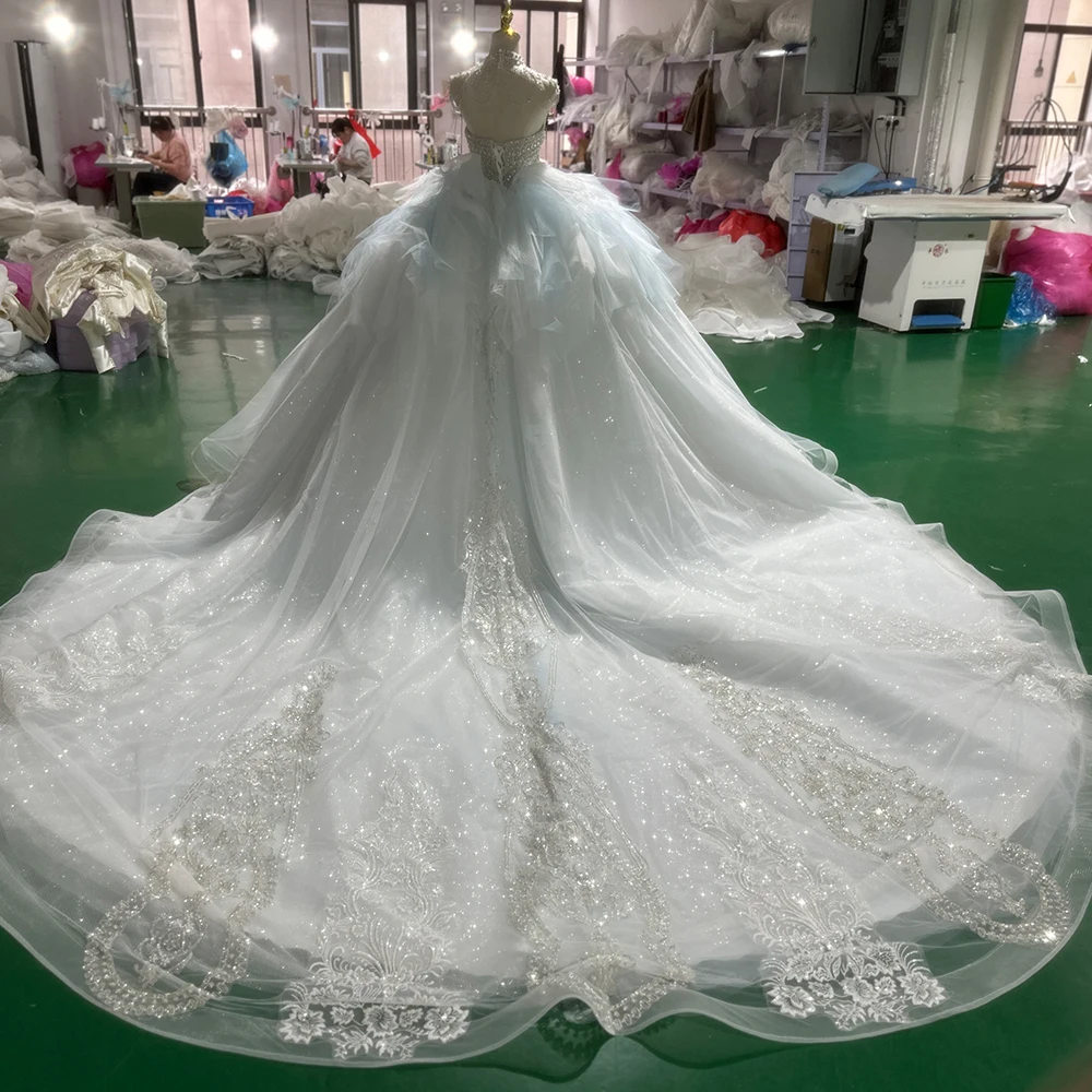 Abiti romantici di Design popolare per le donne 2024 Organza abito da sposa senza schienale lungo fino al pavimento perle Lace Up Suknia tappeti XS032