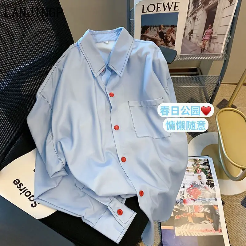 

College style Polo collar blue shirt women's 2025 spring new design sense niche loose casual long-sleeved top