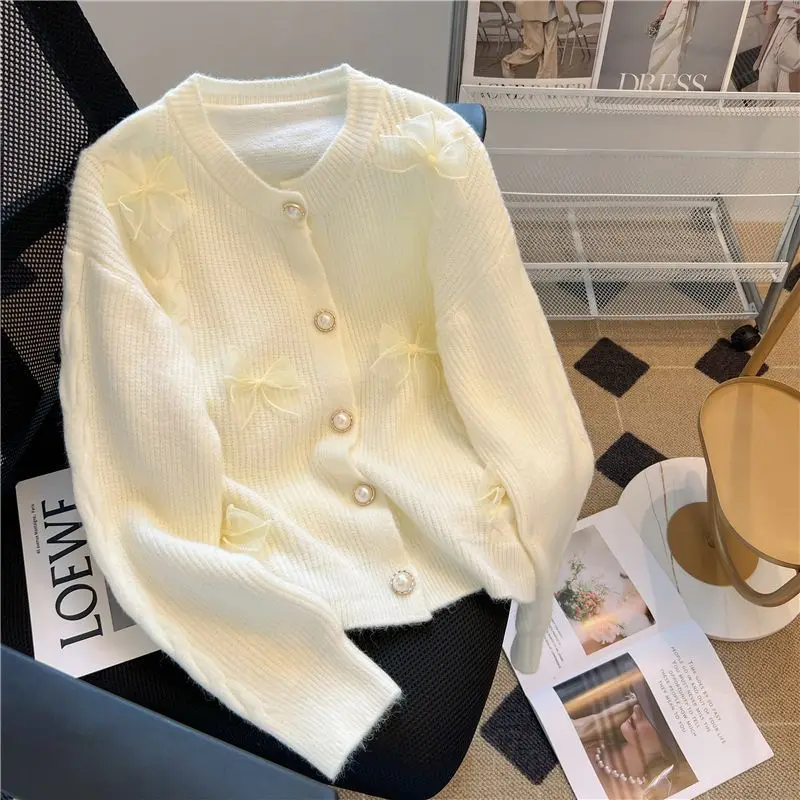 Sweet Wind Bow Knitted Jacket Women\'s Early Autumn High End Soft Glutinous Sweater Unique Korean Version Pearl Button Cardigan