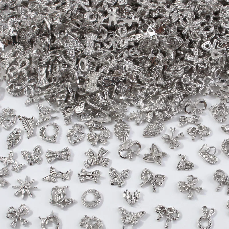 50Pcs/lot 3D Butterfly Alloy Nail Charms Bow-knot Design Jewelry Luxury Gold Silver Hollow Nail Art Decoration Akcesoria luzem