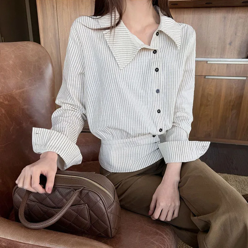 Autumn 2026 New Striped Waist-Tight Shirts Women Fashion Slim Fit Irregular Lapel Blouses Y2K Incline Single-Breasted Shirt Tops