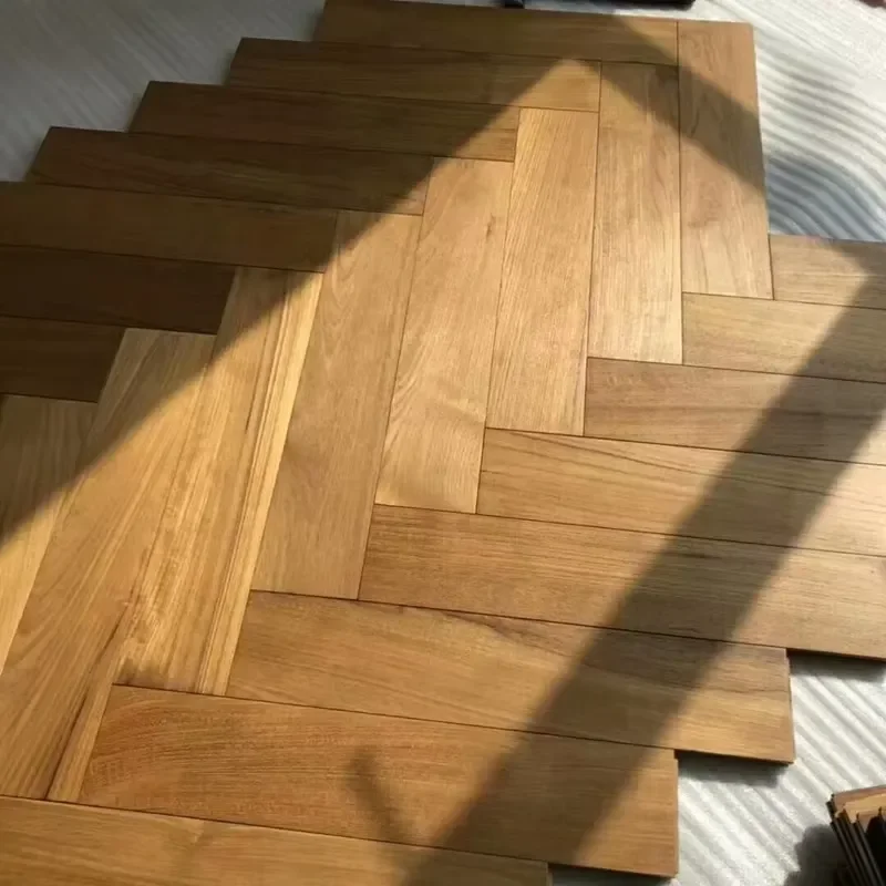 The King of All Woods Authentic Burmese Old Teak Solid Wood Flooring Custom Herringbone Pattern Locking Indoor Chevron Floors