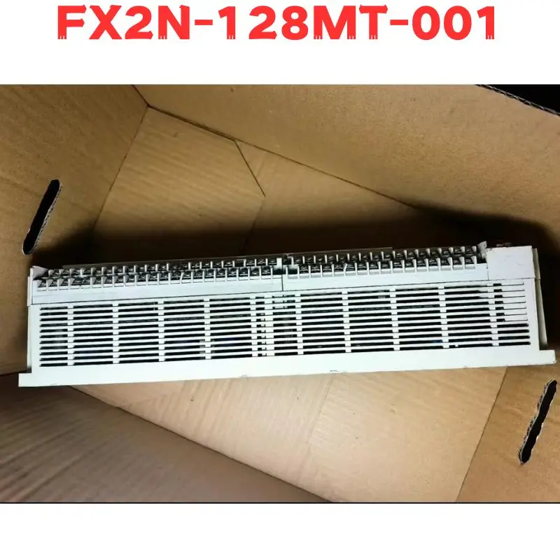 Second-hand FX2N-128MT-001 FX2N 128MT 001 PLC Tested OK