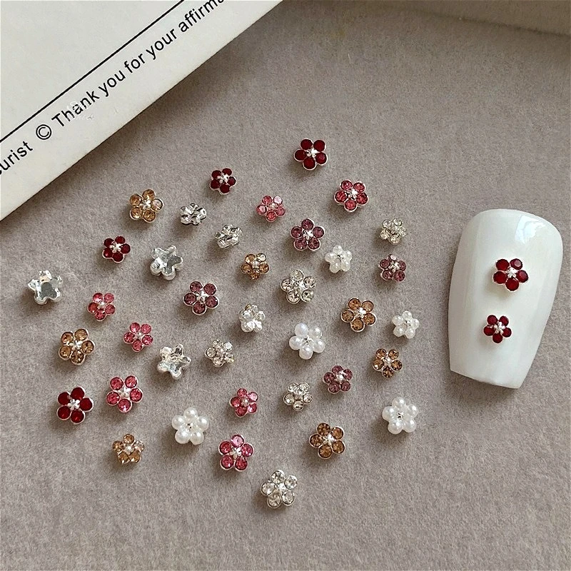 

Mini Colored Flowers Pearls Rhinestones Zircon Petal Alloy Accessories Charms Nail Art Decoration DIY Manicure Jewelry Wholesale