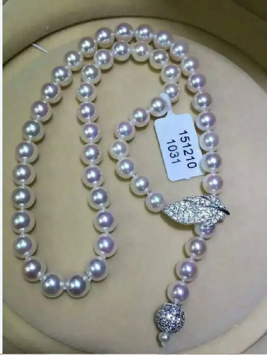 

classic 9-10mm round white pearl necklace 24"