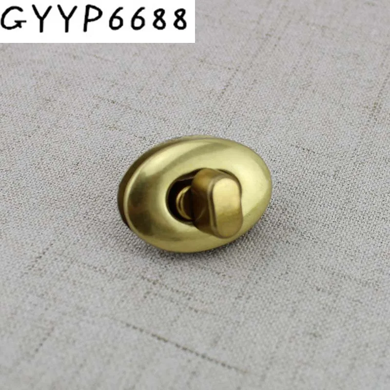 

5sets 20sets Hight qulity Special gold oval lock for bag bright handbags hardware accessories leather twist