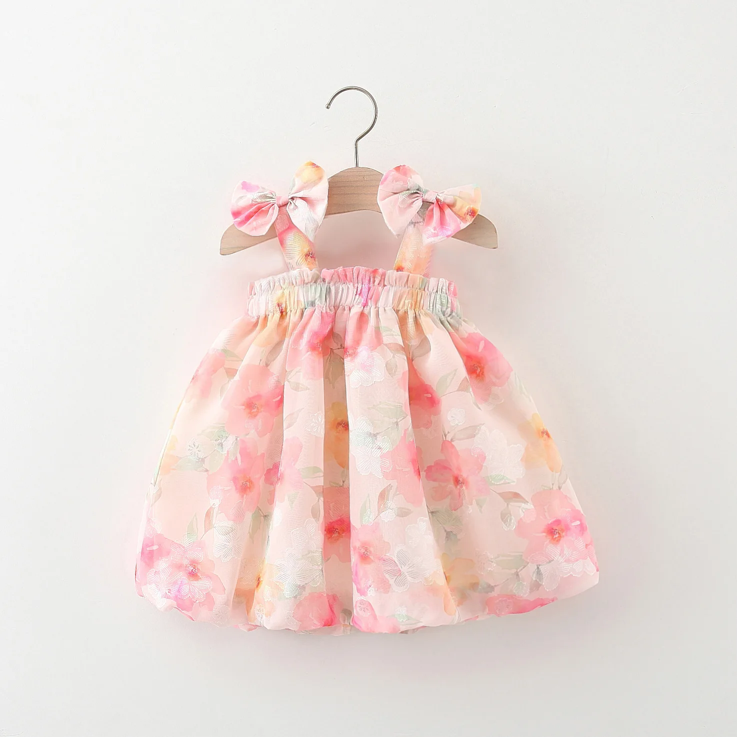 Summer children\'s dress baby girl covered in floral prints two bows and a princess dress with suspenders