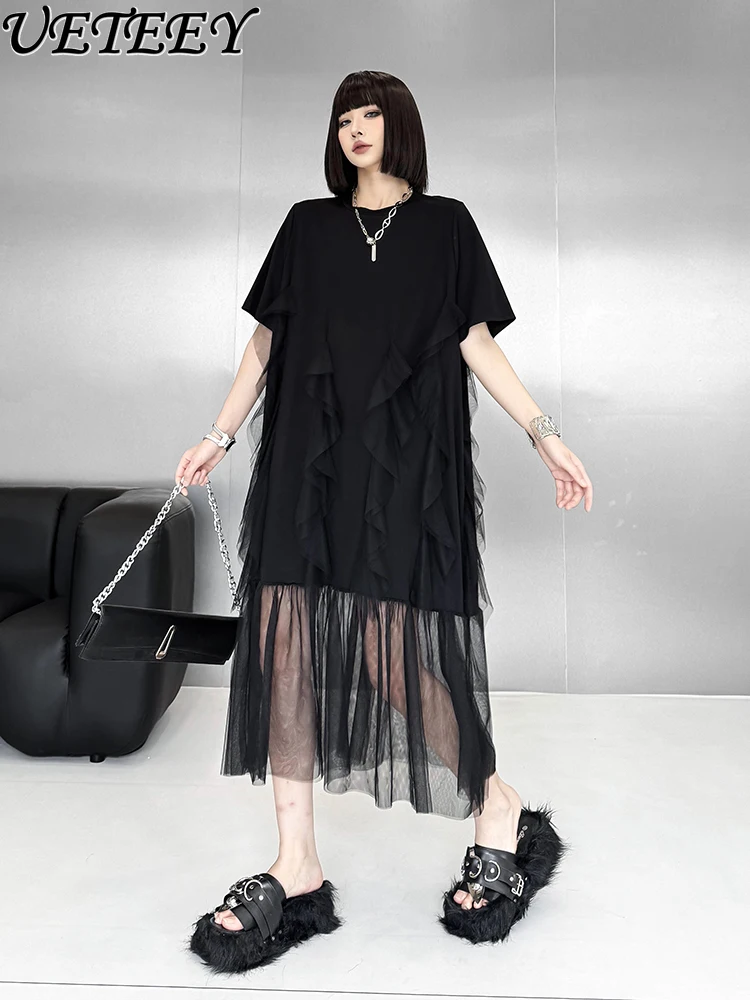 Vestido negro de manga corta con Costura de malla, diseño de nicho, novedad de verano 2021, vestidos holgados de longitud media y finos de Color sólido