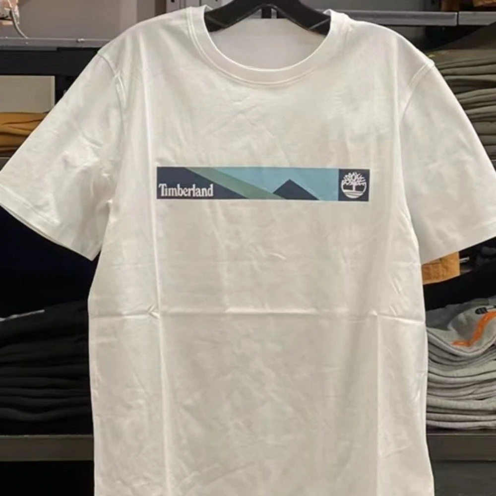 الرجال والنساء للجنسين تي شيرت تمبرلاند الصيف العصرية العلامة التجارية القطن قصيرة الأكمام ربيع الخريف العلامة التجارية الفاخرة شخصية