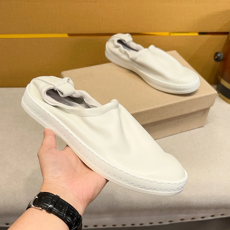 

Повседневные кожаные слипоны для мужчин, дышащие, удобные, модные брендовые, универсальные, на плоском каблуке, с круглым носком, с резиновым вырезом...