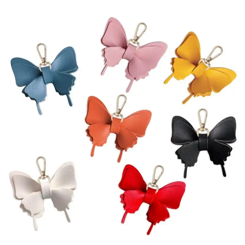Schmetterlings-Schlüsselanhänger aus PU-Leder mit leuchtenden Farben und robustem Metallverschluss, perfekt zum Dekorieren von Rucksäcken und Handtaschen. – Detail 6