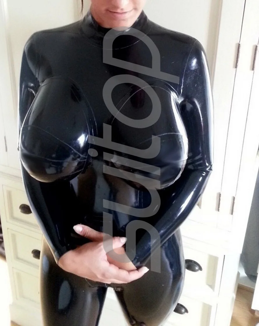 

Women's Black latex catsuit with silicone bust implants packet with back zip to lower abdomens