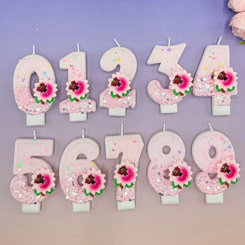 Pink and white sunflower ladybug decorated number candles, festive party gifts, birthday and anniversary candles