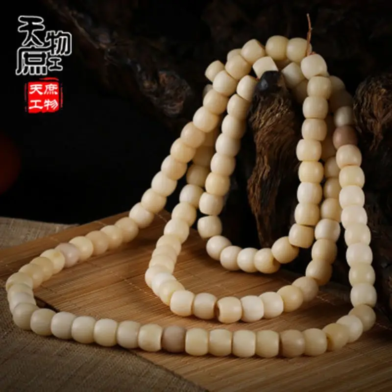 Natural aged camel bone finely crafted vintage-style bead-shaped Buddhist prayer , 108 beads in a long string