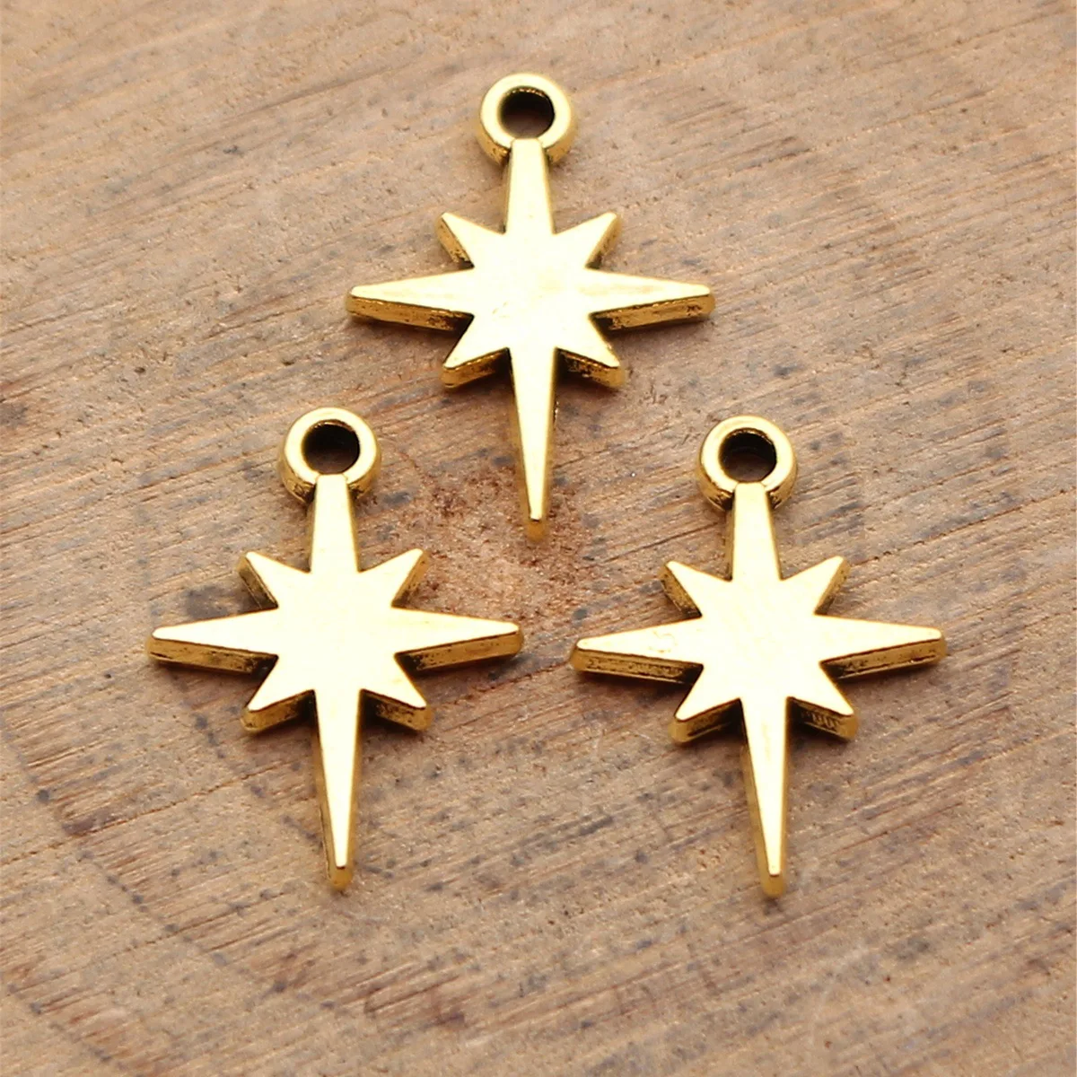 

80 шт. 15x11 мм (0,59x0,43 дюйма) 3 цвета: античное золото, античное серебро, родиевое покрытие, подвески-звездочки в форме сияющей звезды