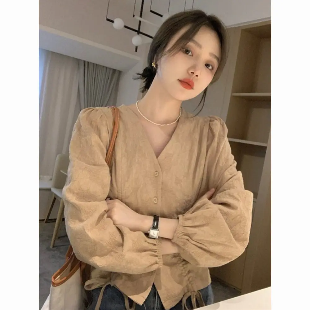 V-neck Shoulder Shirt for Women in Spring Autumn with A Fashionable Design Drawstring Display Long Sleeved Top