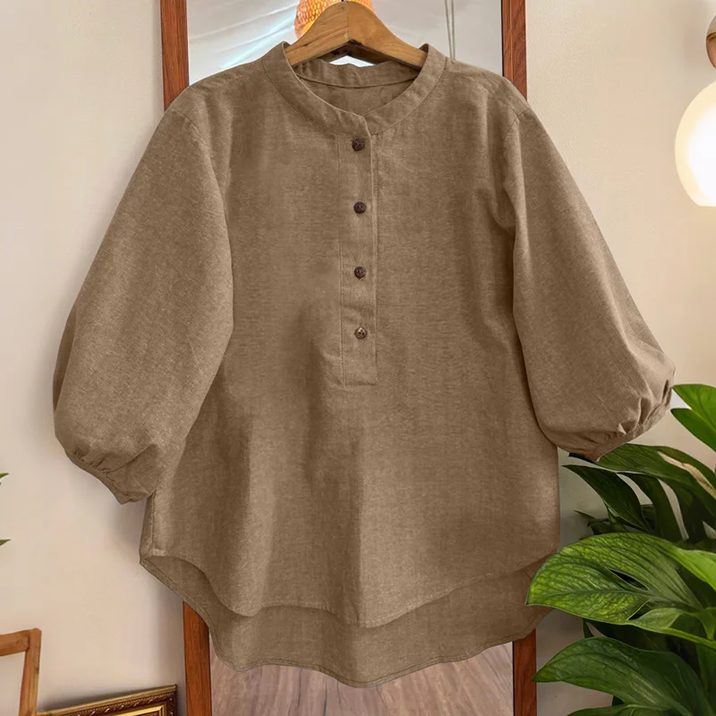 

Женская винтажная блузка ZANZEA, летняя рубашка с воротником-стойкой и рукавом 3/4, повседневная однотонная блуза на пуговицах, топ с асимметричным подолом