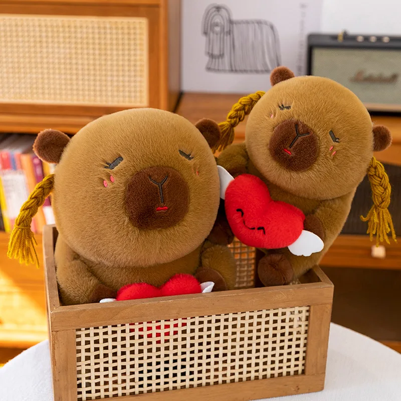 Urocza, brzydka, urocza pluszowa kapibara z kokardkami w kształcie serca, wypchana maskotka, poduszka, lalka dla dzieci, prezent na urodziny, Boże Narodzenie, miękka, przytulna zabawka.